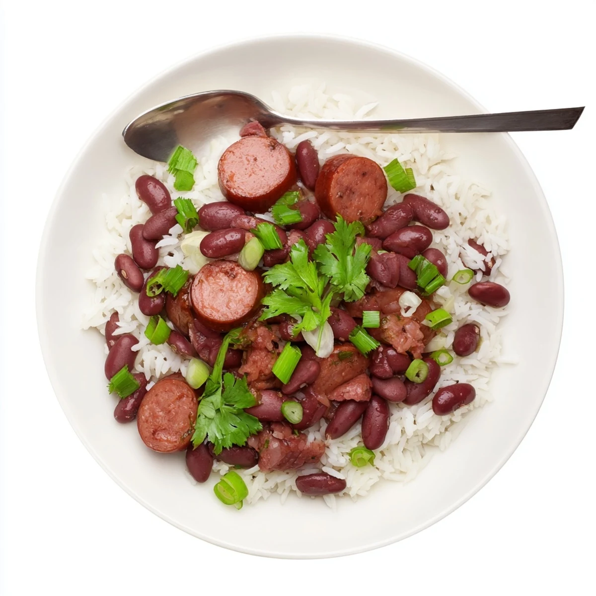 Steaming Creole Red Beans and Rice in a rustic bowl, with tender red beans, spicy halal sausage, and a sprinkle of green onions for a classic Southern meal.