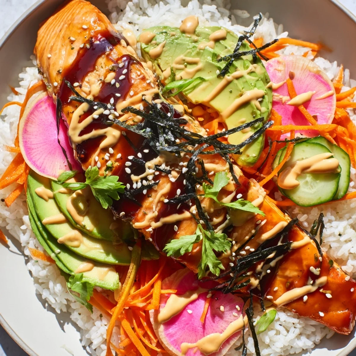 A close-up of the Teriyaki Salmon Rice Taco Bowls shows flaky salmon and crunchy radishes for a fusion meal.