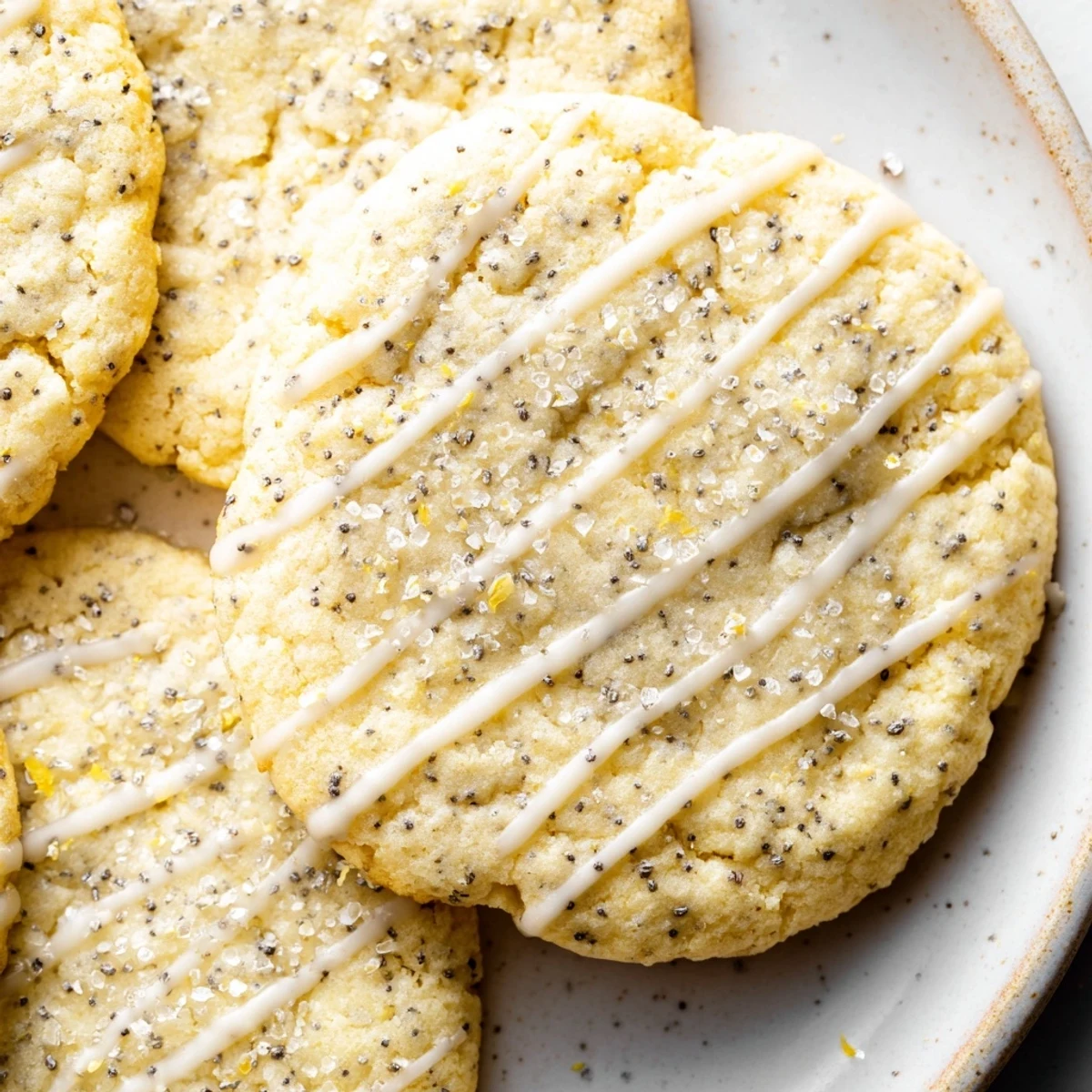 Chewy lemon poppy seed cookies fresh from the oven with lightly browned edges and citrus aroma