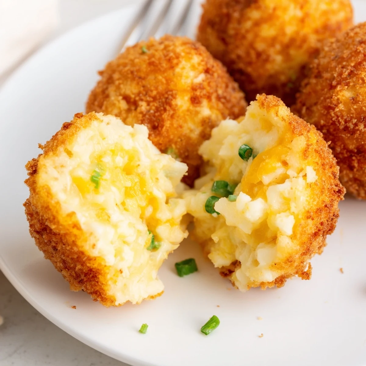 Crispy Fried Mashed Potato Balls served hot with creamy ranch dipping sauce.